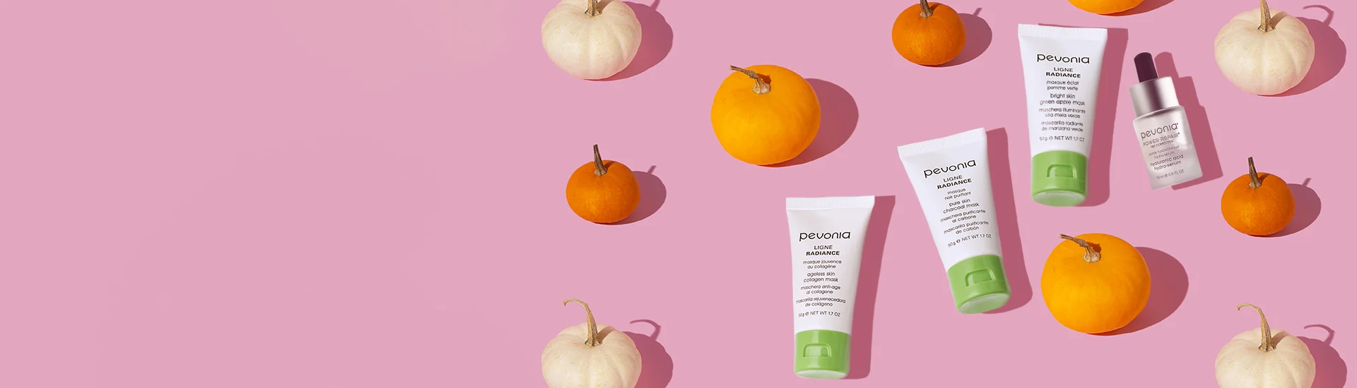 pevonia products surrounded by pumpkins