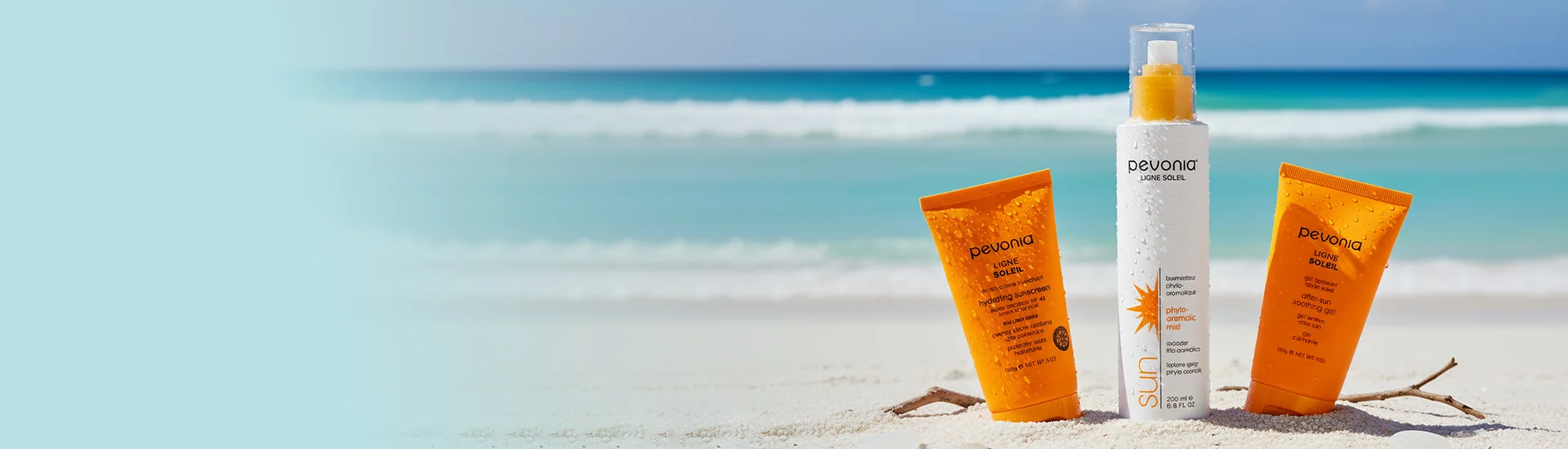 pevonia summer products on a beach