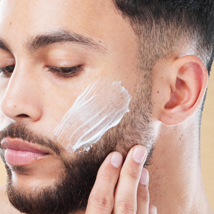 Man model with cream on face